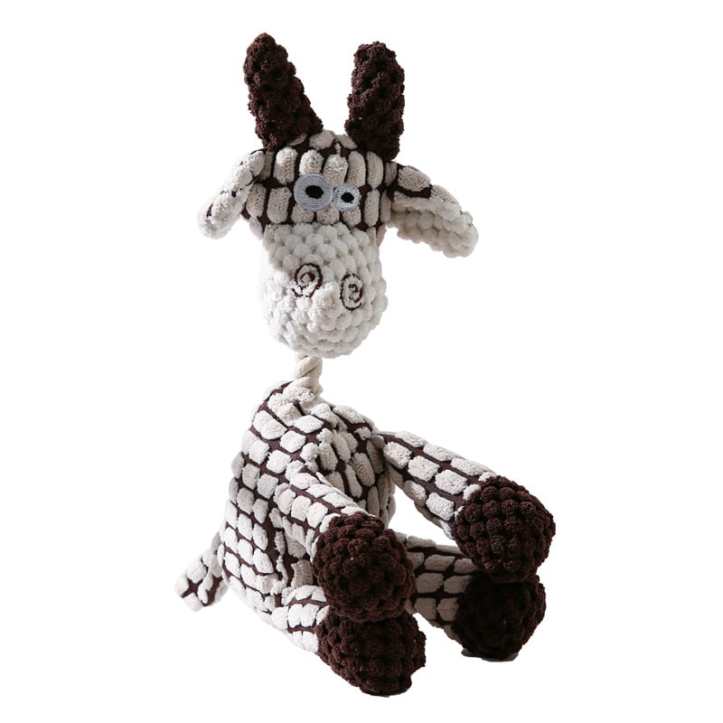 Knitted giraffe toy with brown spots and horns on a white background