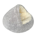 Gray fluffy pet bed with cream interior on a white background