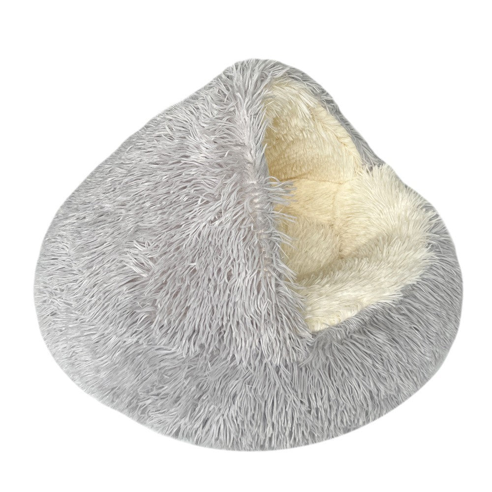 Gray fluffy pet bed with cream interior on a white background