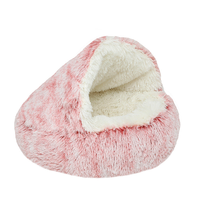 Fluffy pink pet bed on a white background