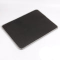 Black textured mat on a white background with Chinese characters