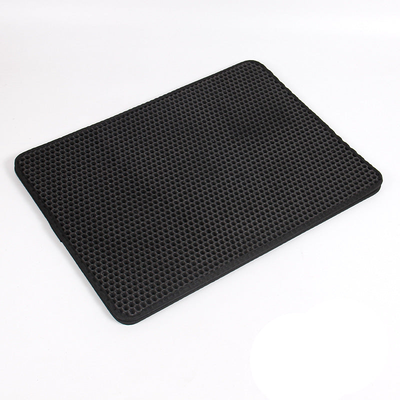 Black metal tray with ribbed design on a white background