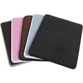 Set of four square coasters with honeycomb texture in black, pink, and gray on a white background.