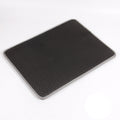 Black textured mat on a white background with Chinese characters