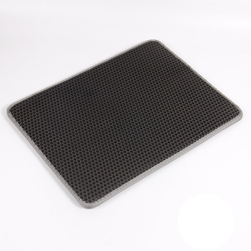 Black textured mat on a white background with Chinese characters