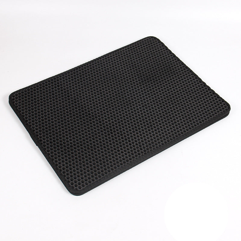 Black metal tray with ribbed design on a white background